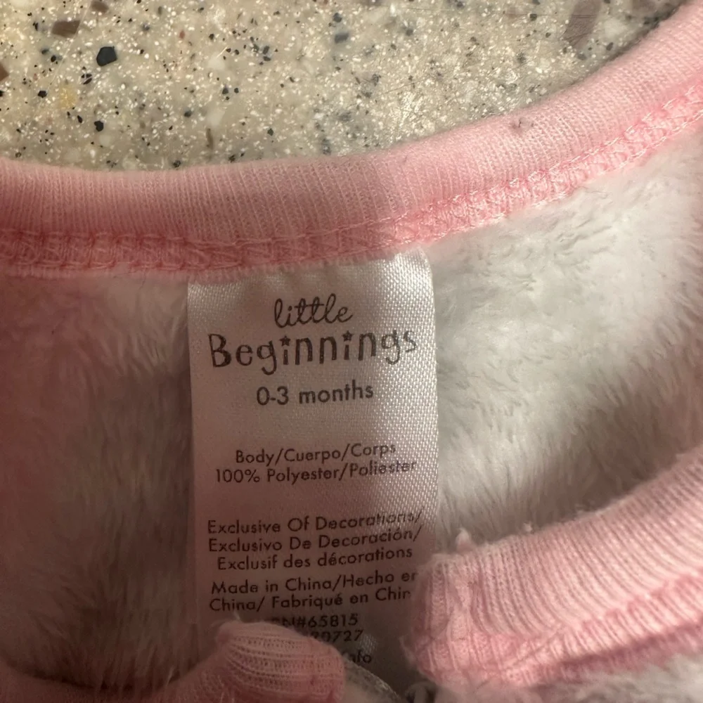 0-3 Month Fuzzy Footed Sleepers.